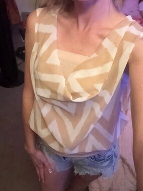 Cute creme colored top with built In tube top size small women's